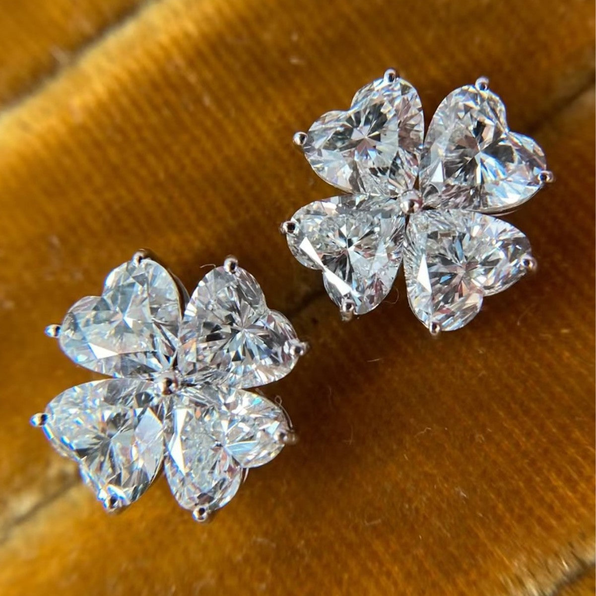 Flower  stud earrings heart-shaped four-petal design
