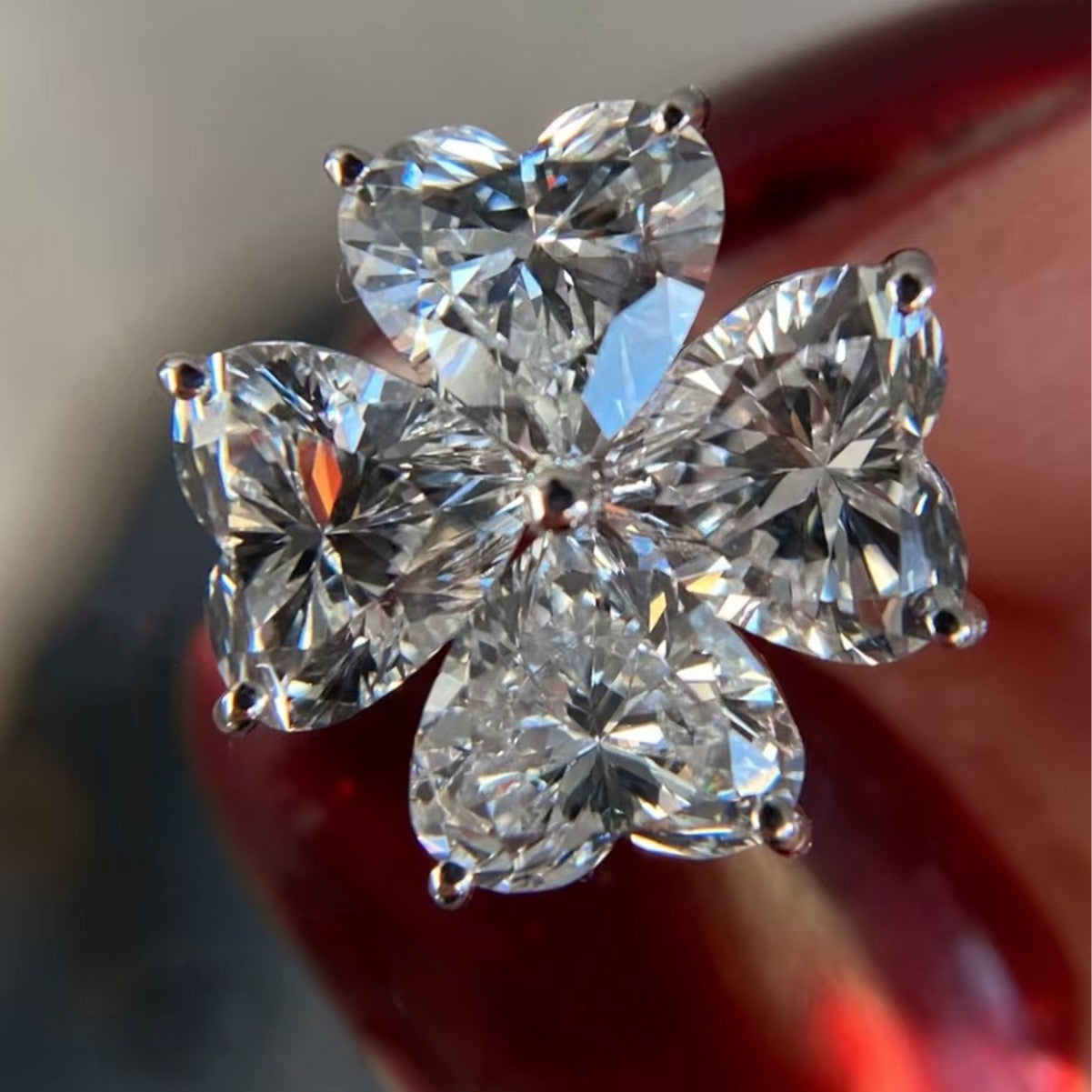 Flower  stud earrings heart-shaped four-petal design